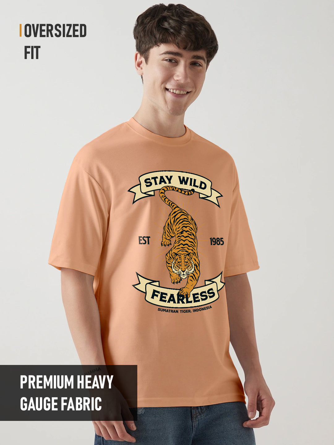 Stay Wild Graphic Printed Oversized T-Shirt - Peach Fuzz